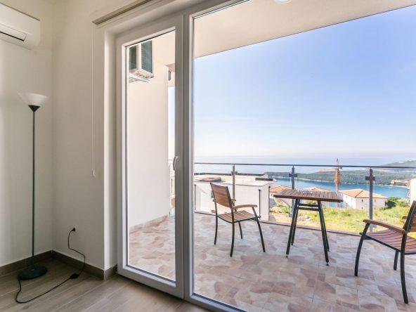An exquisite 2-bedroom apartment for sale in a new residential complex with a swimming pool and incredible sea view in a quiet suburb of Budva.